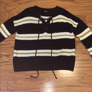 Black sweater with white and yellow stripes